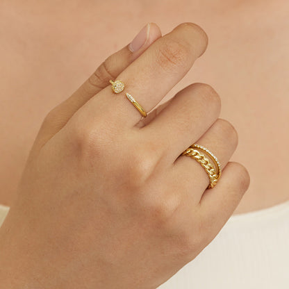 Gold curb chain ring on finger, wide dome-link band