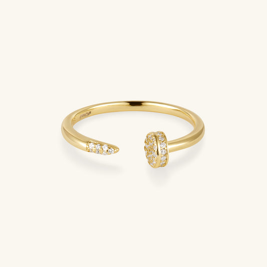 Gold-tone nail ring with oval and round cubic zirconia accents on slim band