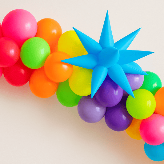 Balloon cluster with neon blue starburst balloon and multicolor round balloons