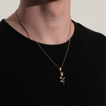Gold rope chain rose pendant necklace with leaf charm at center