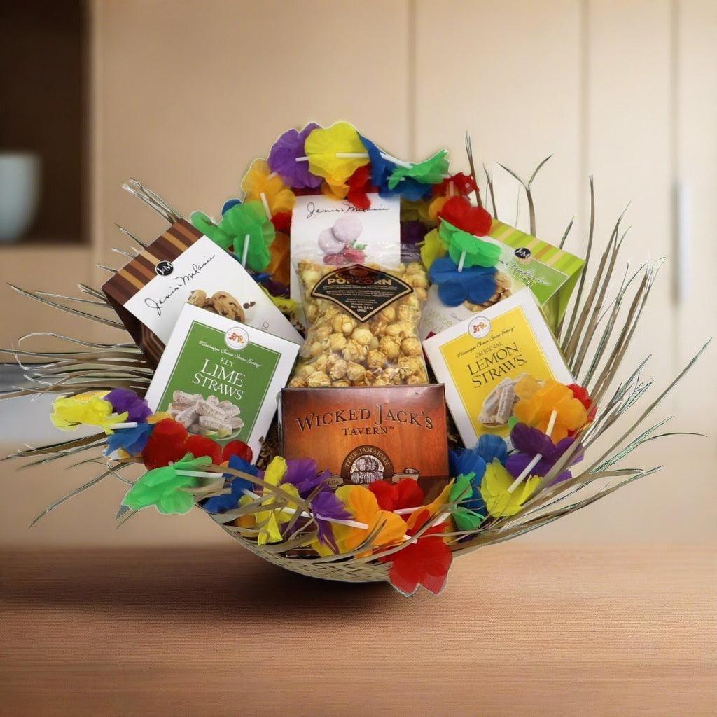 Woven straw gift basket filled with colorful shredded accents, candies, and snack boxes
