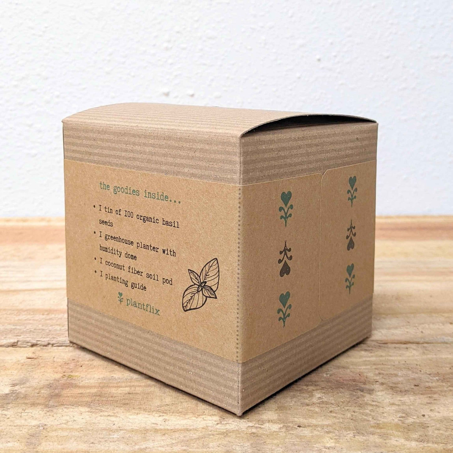 Kraft basil seed kit box with printed planting instructions and leaf pattern