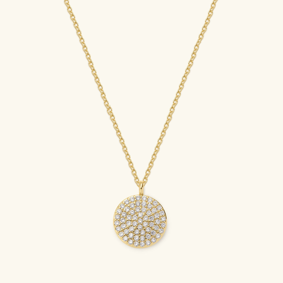 Gold necklace with round pavé disc pendant