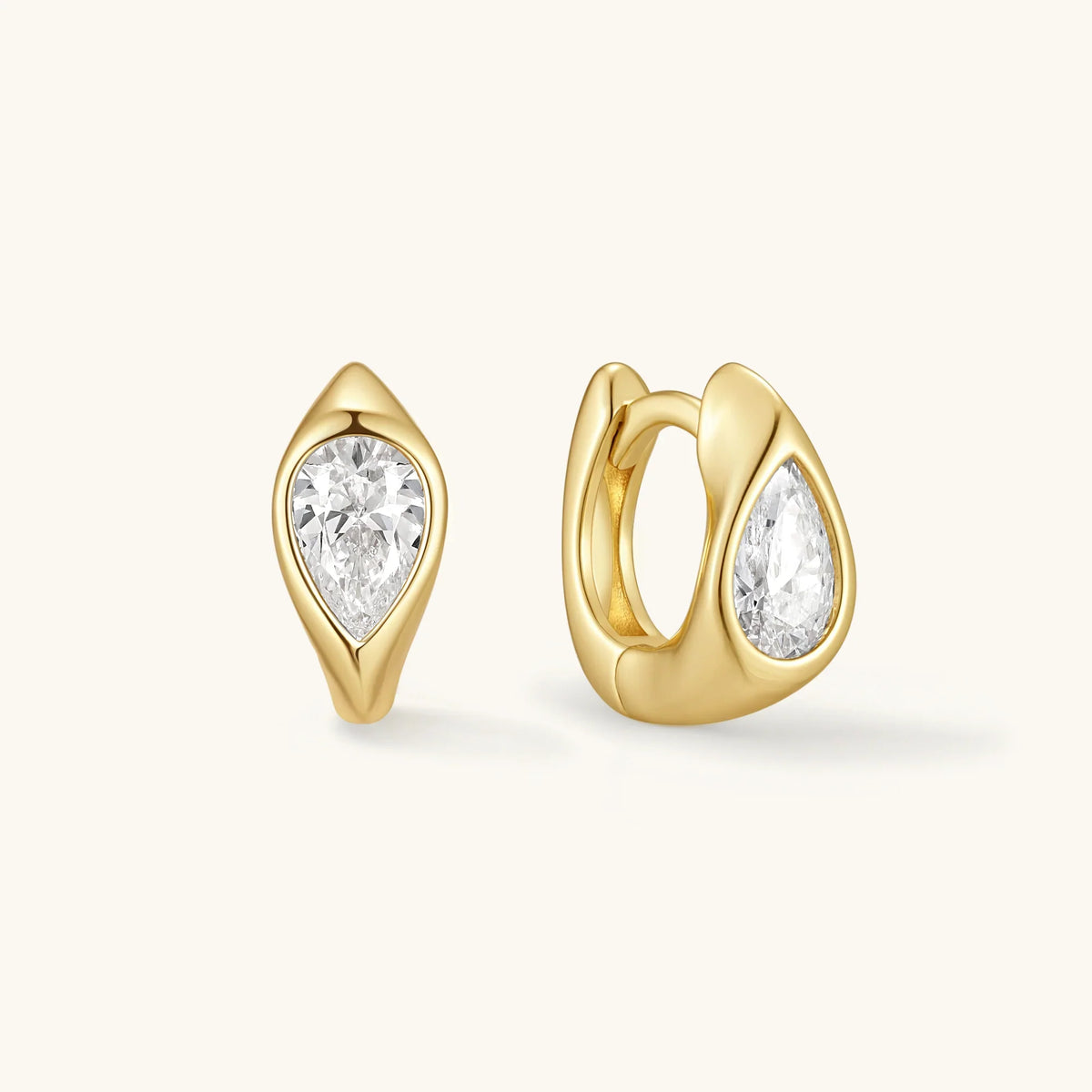 Gold-tone wavy hoop earrings with clear round stones, hinged pair