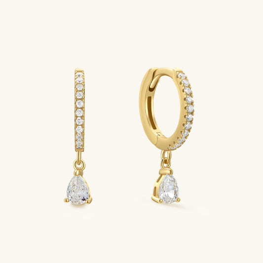 Gold pear-drop hoop earrings with bezel-set clear stones