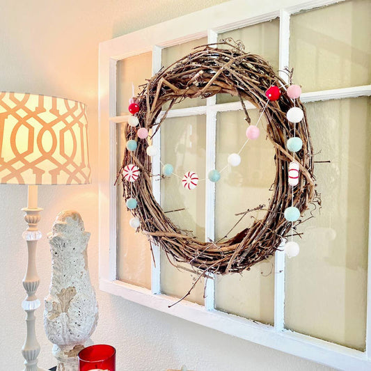 Peppermint felt ball garland wreath with woven branch ring and dangling felt balls