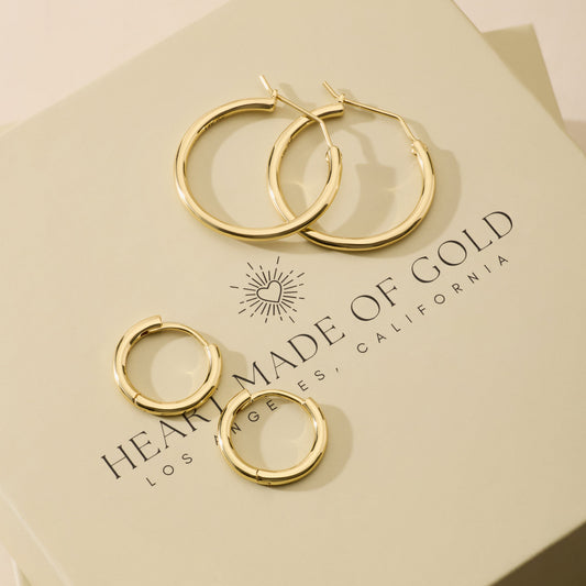 Gold-tone plain hoop earrings set, round hinged hoops with smooth finish