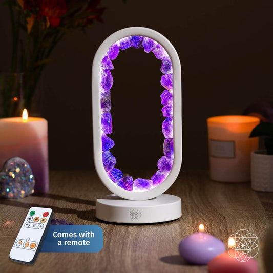 Amethyst style LED lamp with glowing purple crystal arch in white base