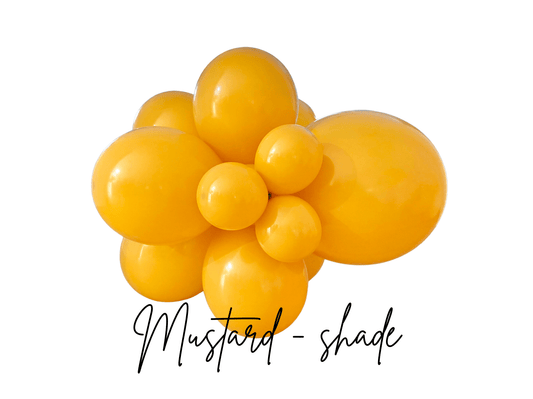 Mustard yellow latex balloon cluster with glossy round balloons, side view