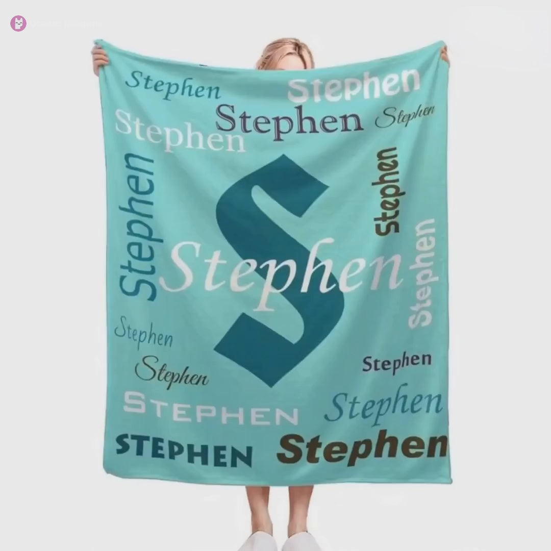 Stephen name blanket showcased by a smiling woman.