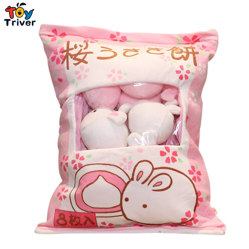Pink bunny pillow plush pouch with bunny face graphic and bunny plush inside