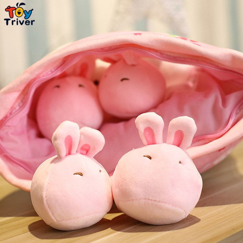 Open pink bunny pillow plush pouch with three stuffed bunnies peeking out