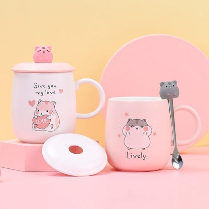 Pink hamster-themed ceramic mug with lid, front love-heart design, matching handle