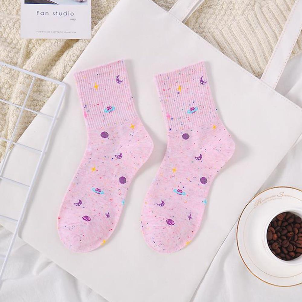 Pink ribbed crew socks with galaxy prints of moons, planets, and stars
