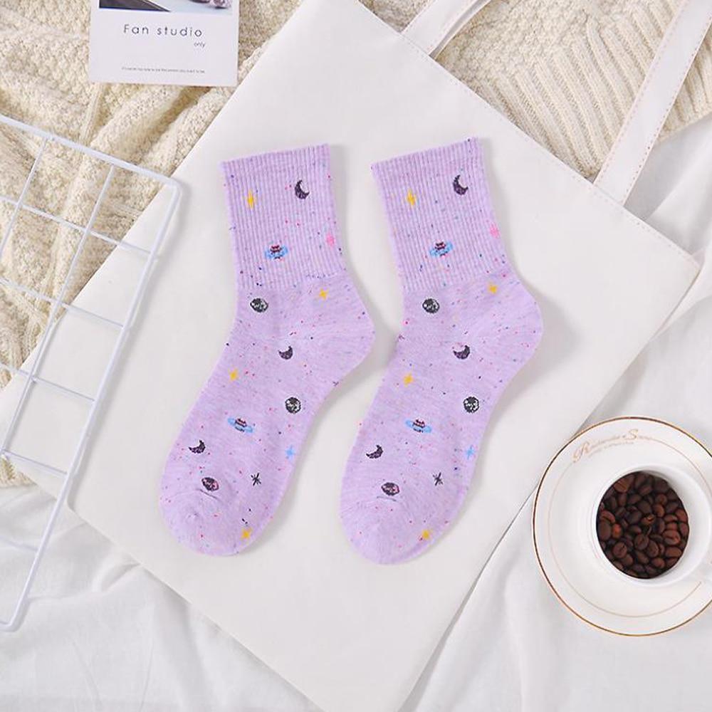 Lavender ribbed crew socks with moon, planet, and star galaxy pattern