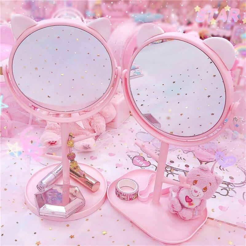 Cat-ear vanity makeup mirror with two round mirrors, pink stand, and tray base