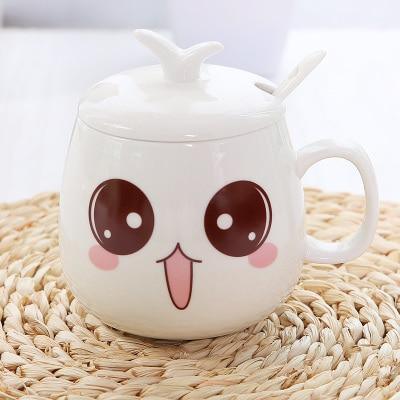 White ceramic face mug with lid, large round eyes, and pink nose and blush