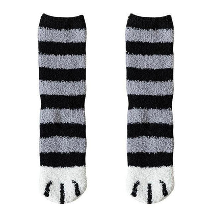 Black socks with light gray horizontal stripes and white toe panel cat-face detail