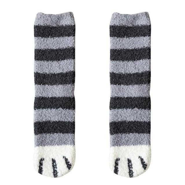 Pair of gray striped socks with white toe panel and black cat-face accents