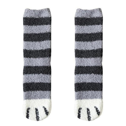 Pair of gray striped socks with white toe panel and black cat-face accents