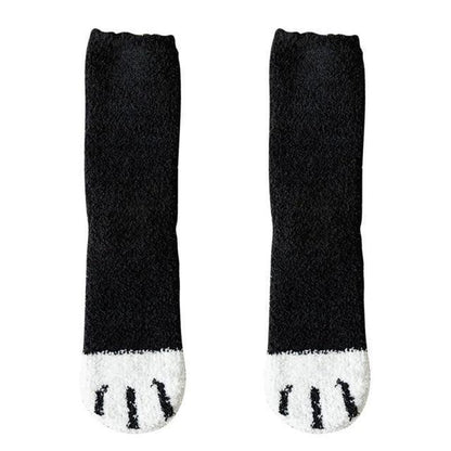 Black knit socks with white toe panel and small black cat-face design