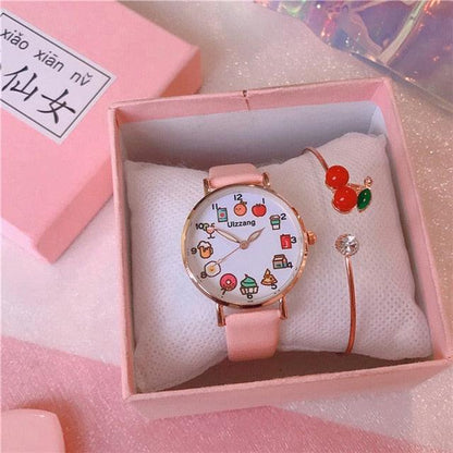 Gift box set with white strap watch, food-themed dial, red cherry charm bracelet and bangle
