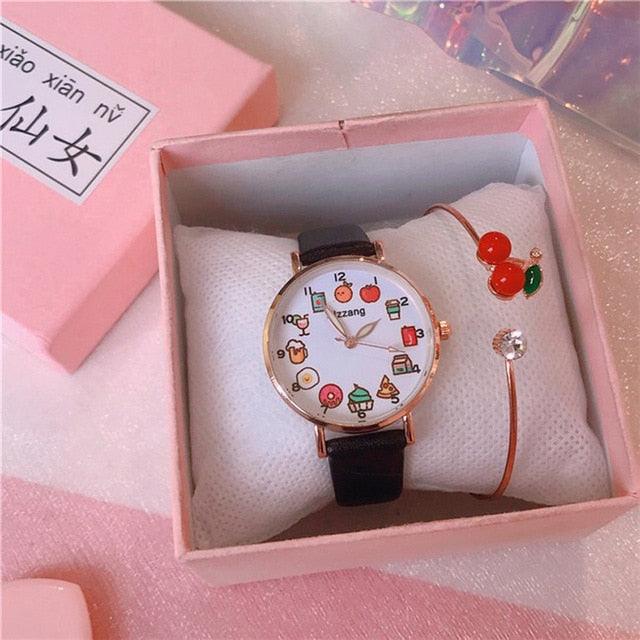 Gift box set with black strap watch, food-themed dial, and red cherry charm bracelet
