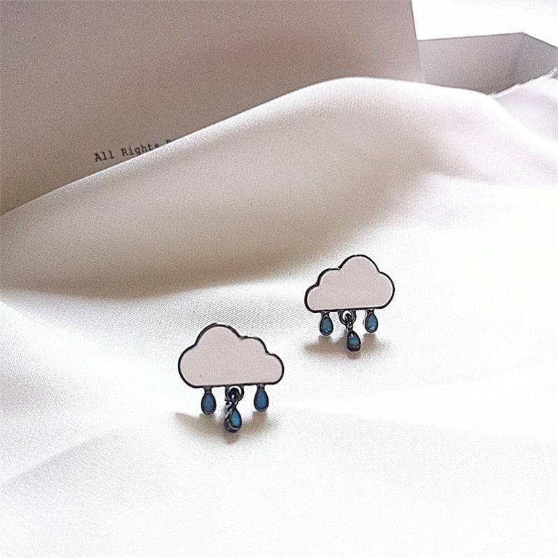 Cloud-shaped stud earrings with blue raindrop details, two-piece pair