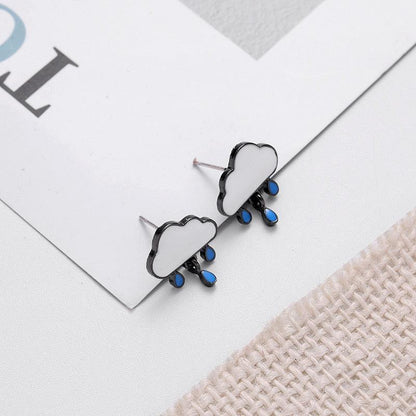 Cloud-and-rain stud earrings with white clouds, blue drops, and dark posts
