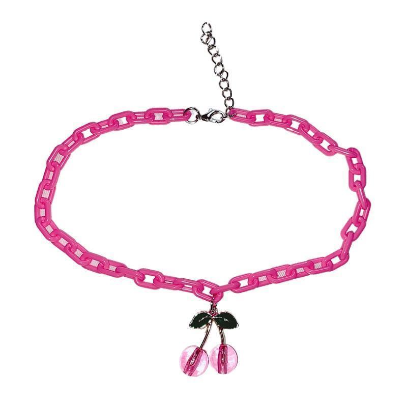 Pink chain necklace with clasp and three cherry charms, black leaf detail, silver-tone chain