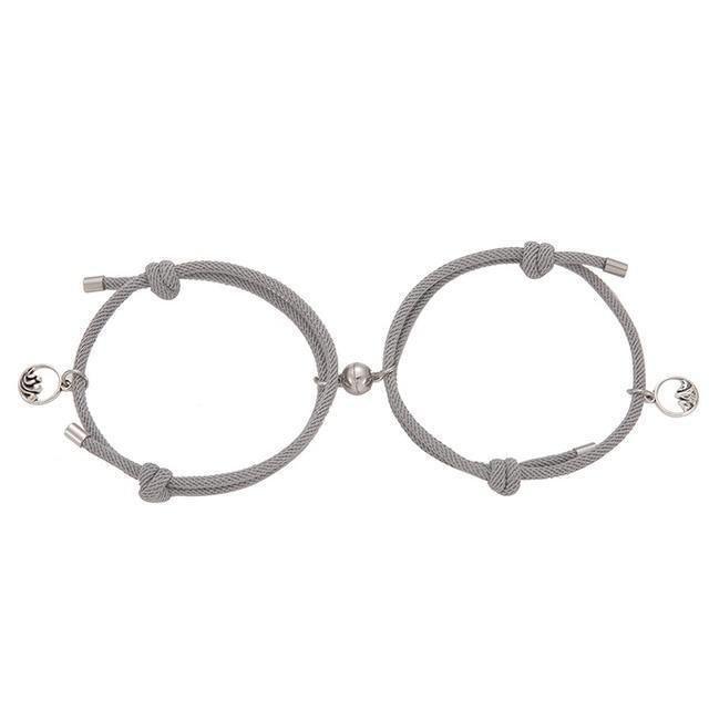 Magnetic attraction bracelet set, gray braided cords with silver tube ends and heart charm medallions