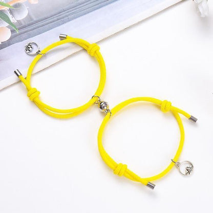 Magnetic attraction bracelet set, yellow braided cord bracelets with silver heart charm and ends