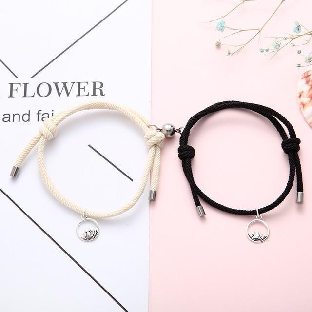 Magnetic attraction bracelet set, beige and black braided cords with silver tube ends and heart charms