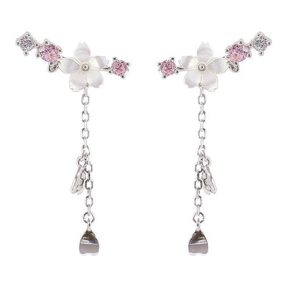 Cherry blossom drop charm earrings with pink crystal flowers and long teardrop dangles