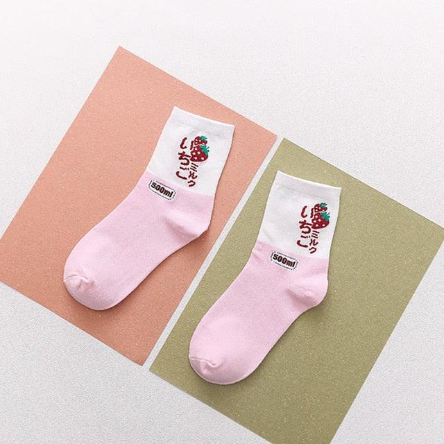 Kawaii white socks with light pink panels and red berry “MILK” text