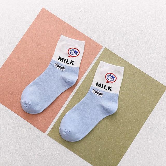 White socks with red sailor icon and “MILK” text with small “500ml” mark