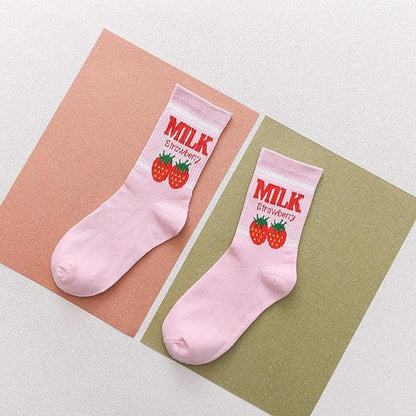 Kawaii white socks with pink panels and red berry “MILK” text