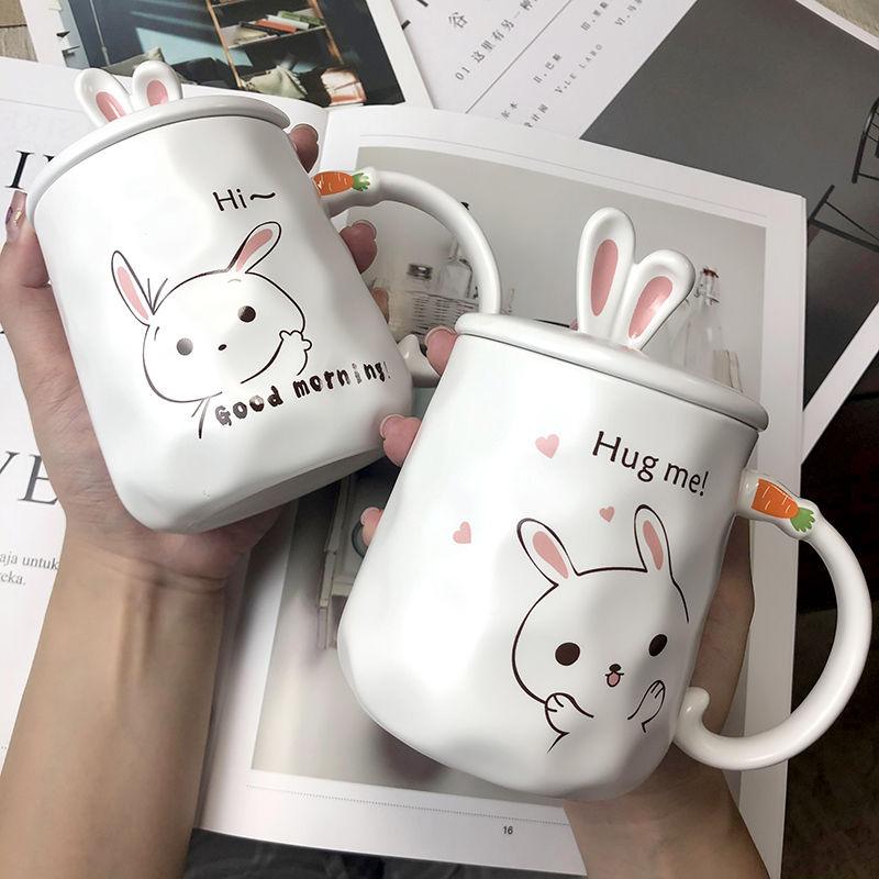 White ceramic bunny mug: 'Good morning' rabbit face with pink ears.