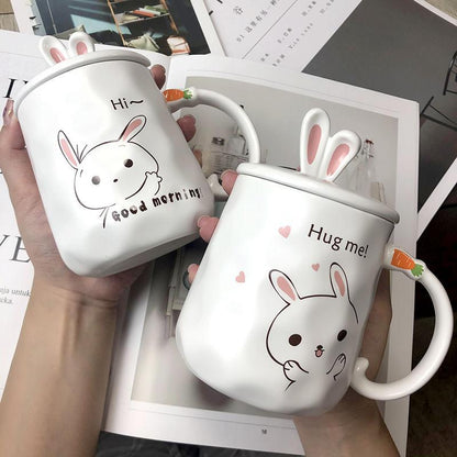 White ceramic bunny mug: 'Good morning' rabbit face with pink ears.