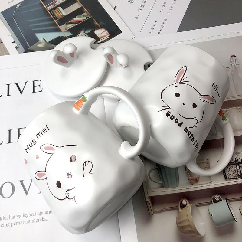 White ceramic bunny mug with rabbit illustration, pink ears, carrot details, 'Hi~' on front