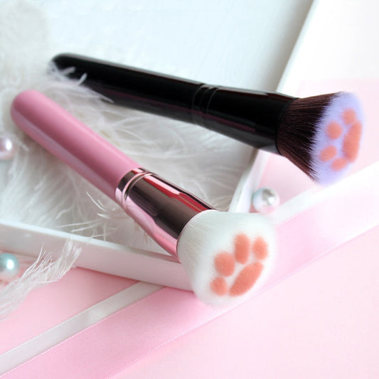 Cat paw makeup brushes with fluffy bristles and pink/black handles