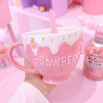 Strawberry milk mug with pink drip design and strawberry fruit accents