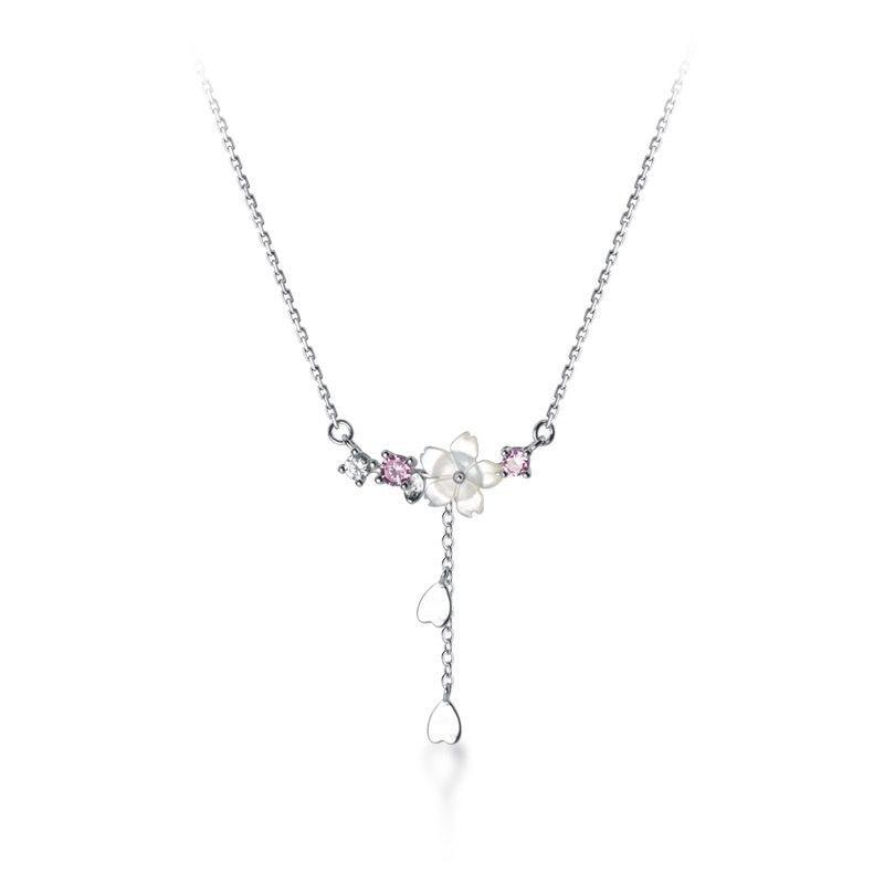 Silver-tone sakura pendant necklace with pink stones and hanging teardrop charm