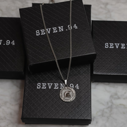 Spartan warrior pendant necklace with round emblem on black gift box