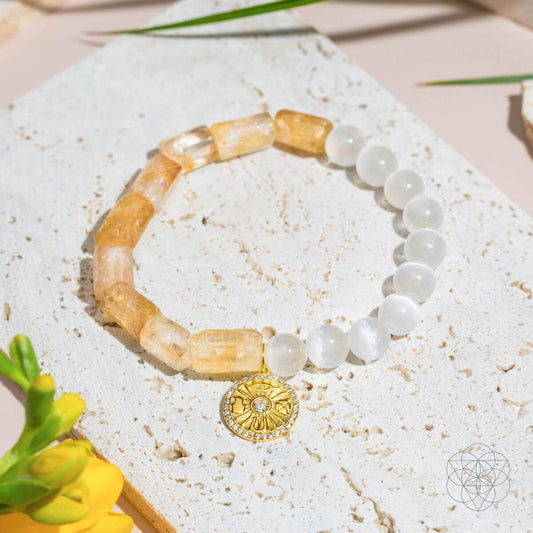 Citrine and selenite beaded bracelet with gold sun charm and round white stones