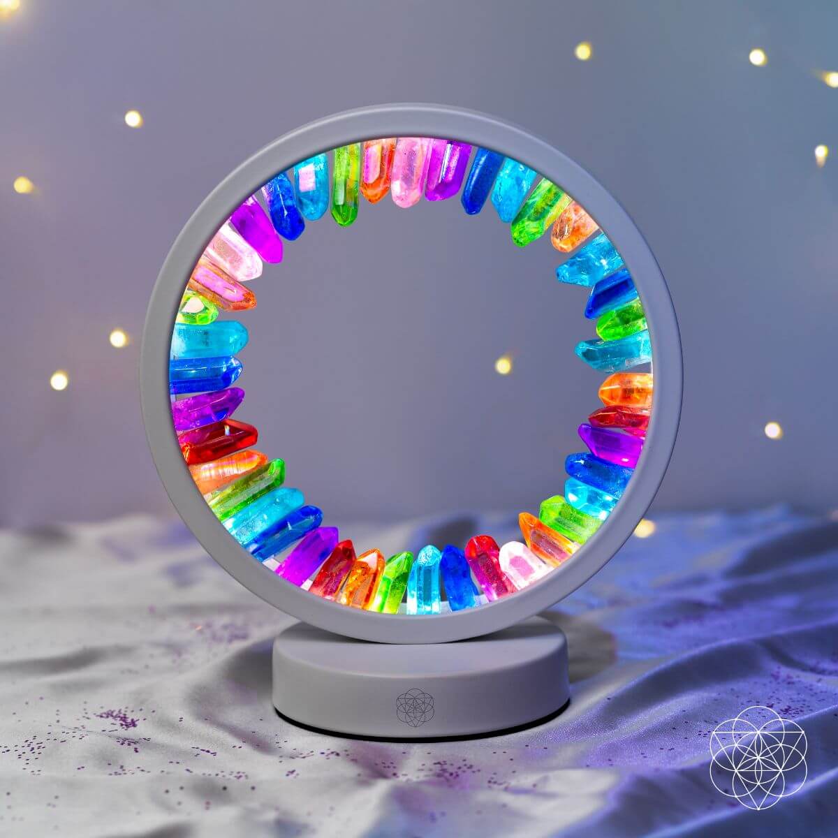 Rainbow aura lamp with circular multicolor light ring and lit decorative dots