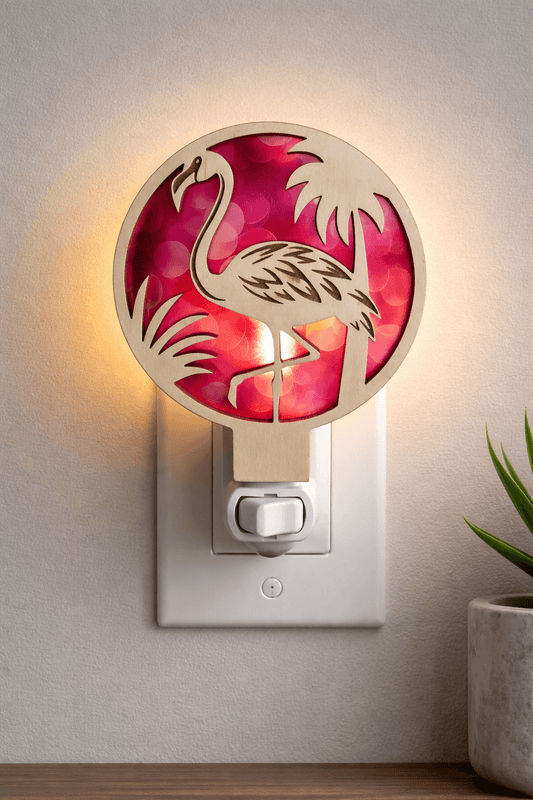 Flamingo tropical LED nightlight with circular tropical design and pink light glow, wall plug