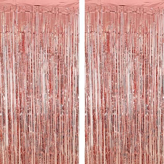 Rose gold fringe curtain with dense vertical metallic strands, full panel view
