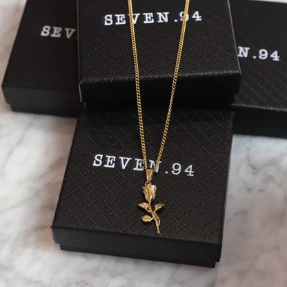 Gold rose pendant necklace set on two rope chains
