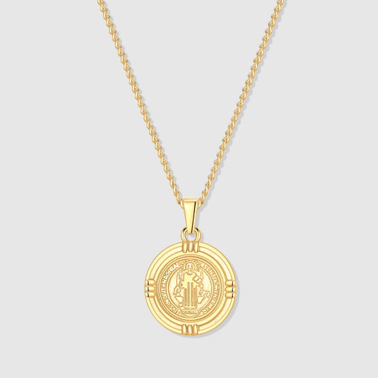Gold Saint Benedict medal necklace with round medallion pendant and curb chain